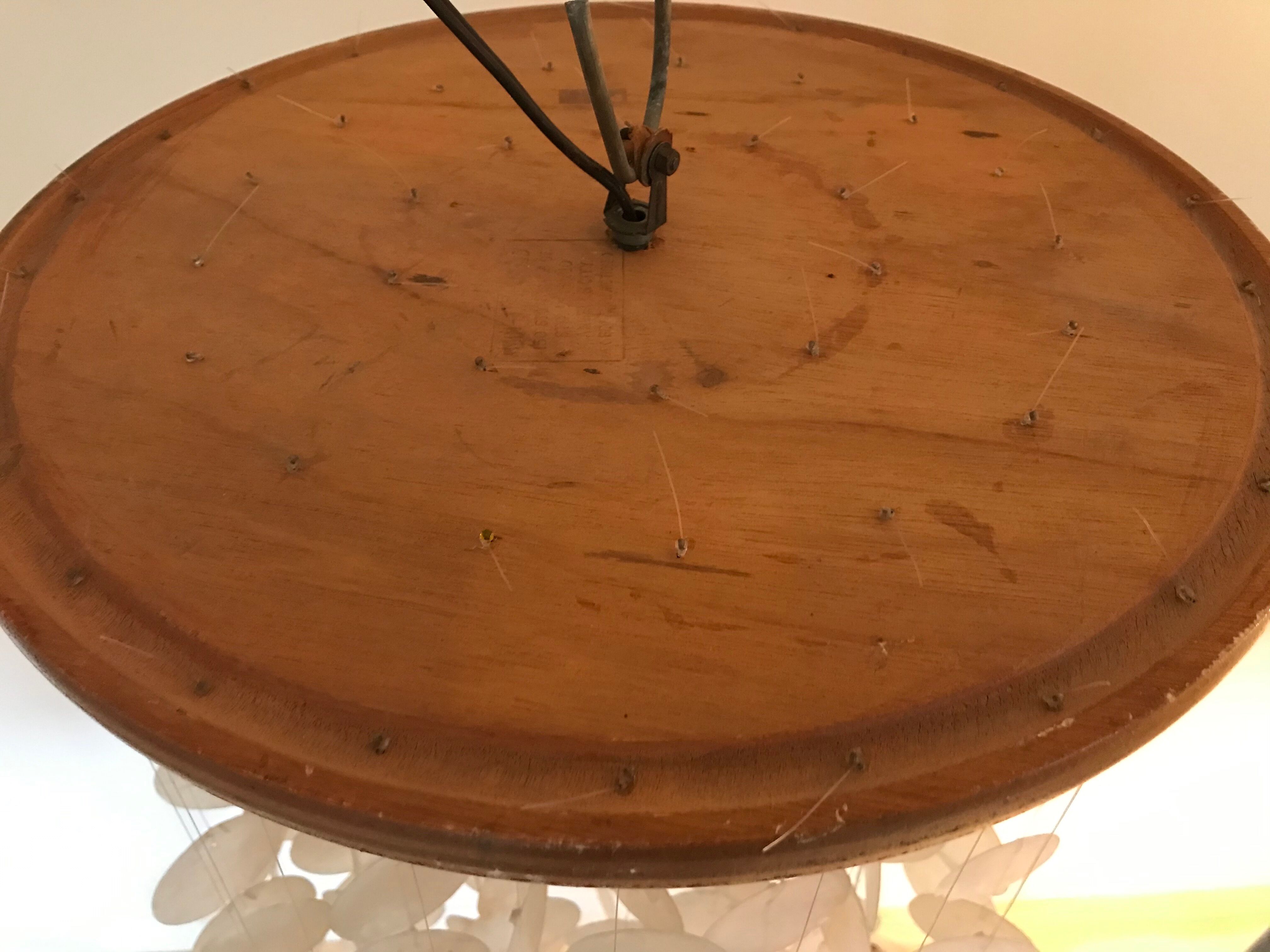 Suspension with mother-of-pearl stamps