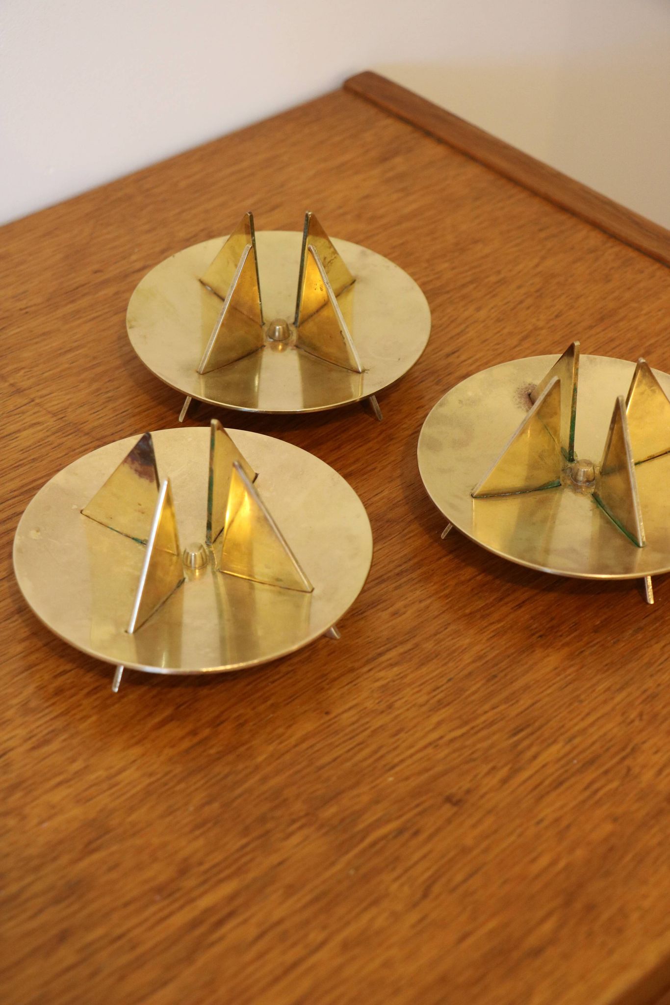 Scandinavian trio of candlesticks in brass by Pierre Forsell for Skultuna.