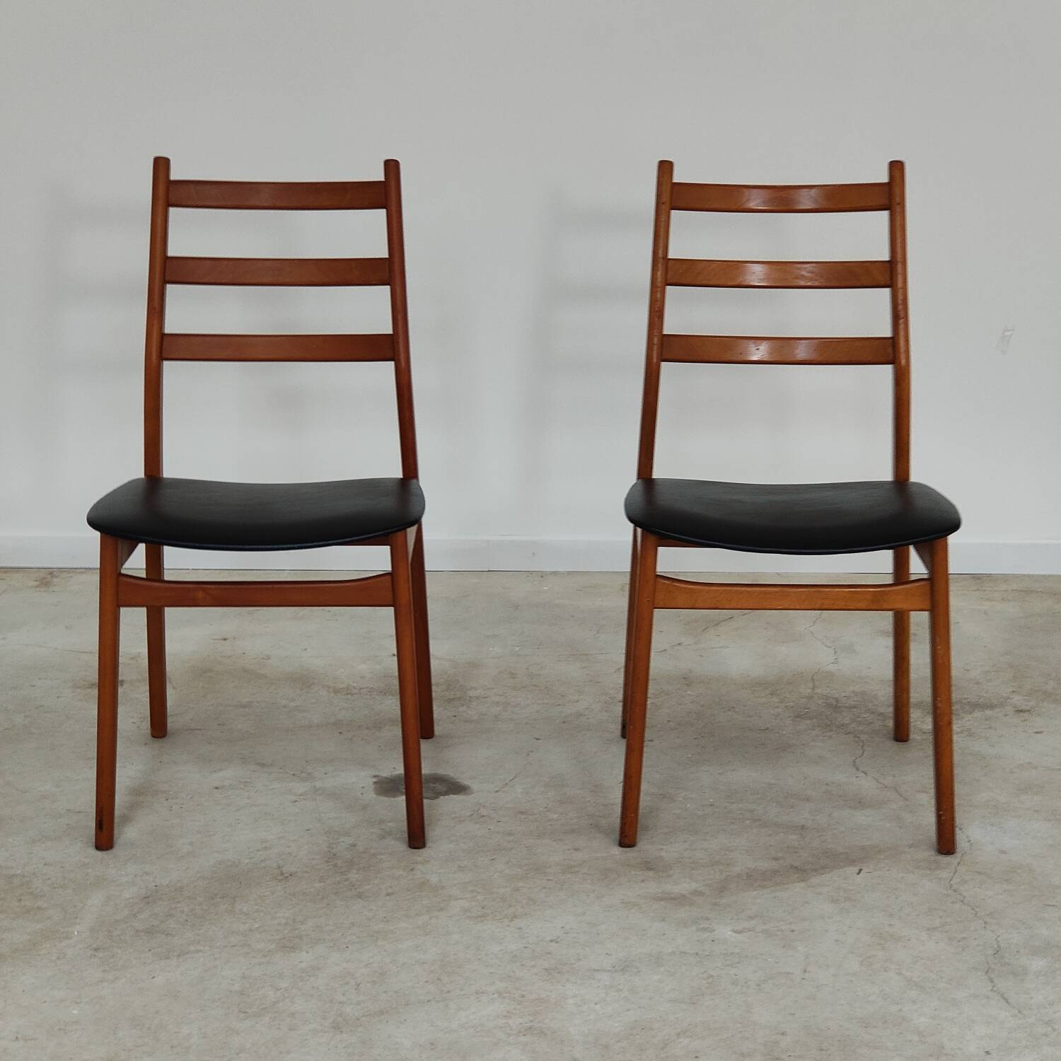 Pair of Scandinavian style leather and wood chairs 1970