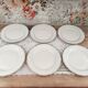 Set of 6 flat plates in fine white Bohemian porcelain with a gold rim.