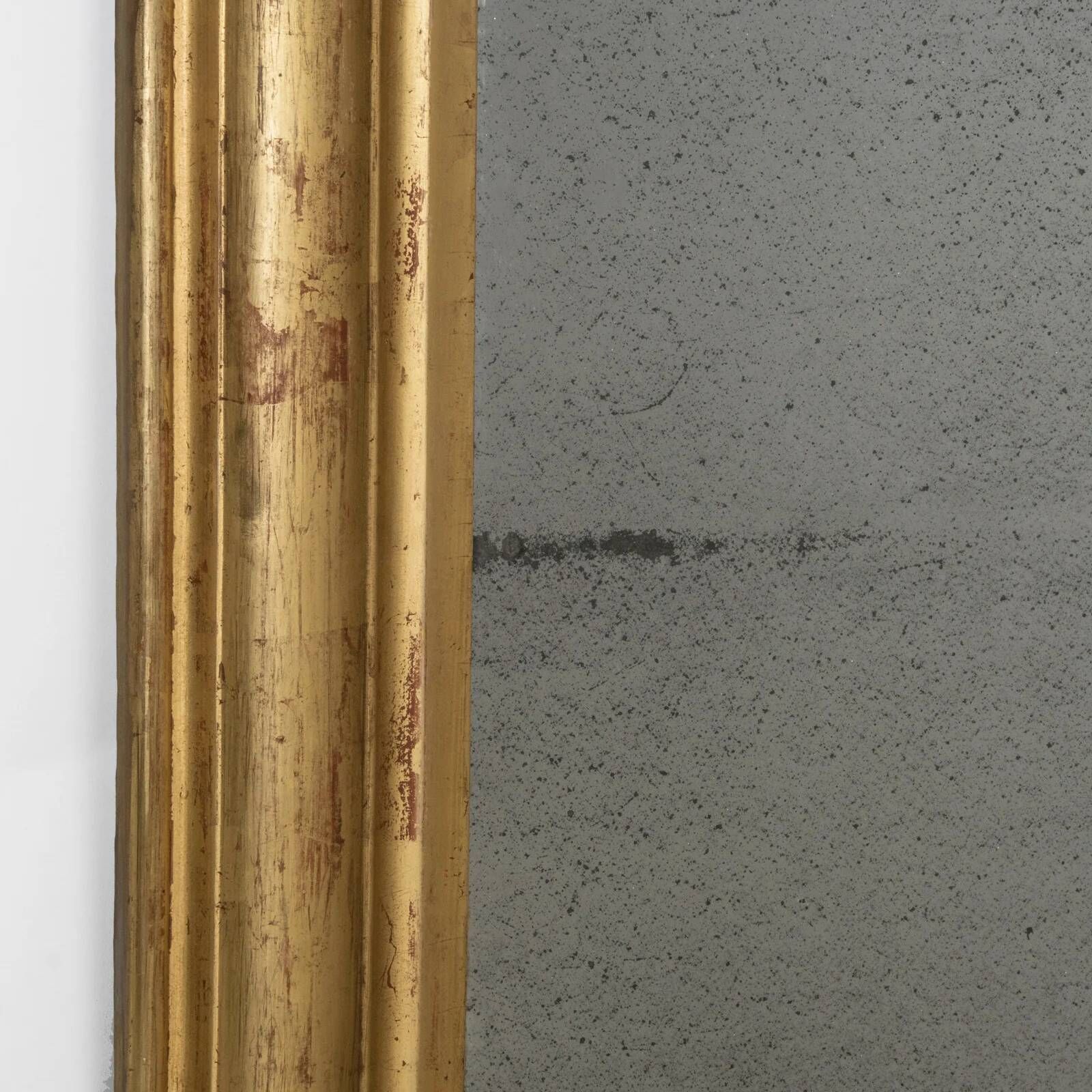Louis-Philippe mirror from the 19th century with foliage and grape cluster motifs.