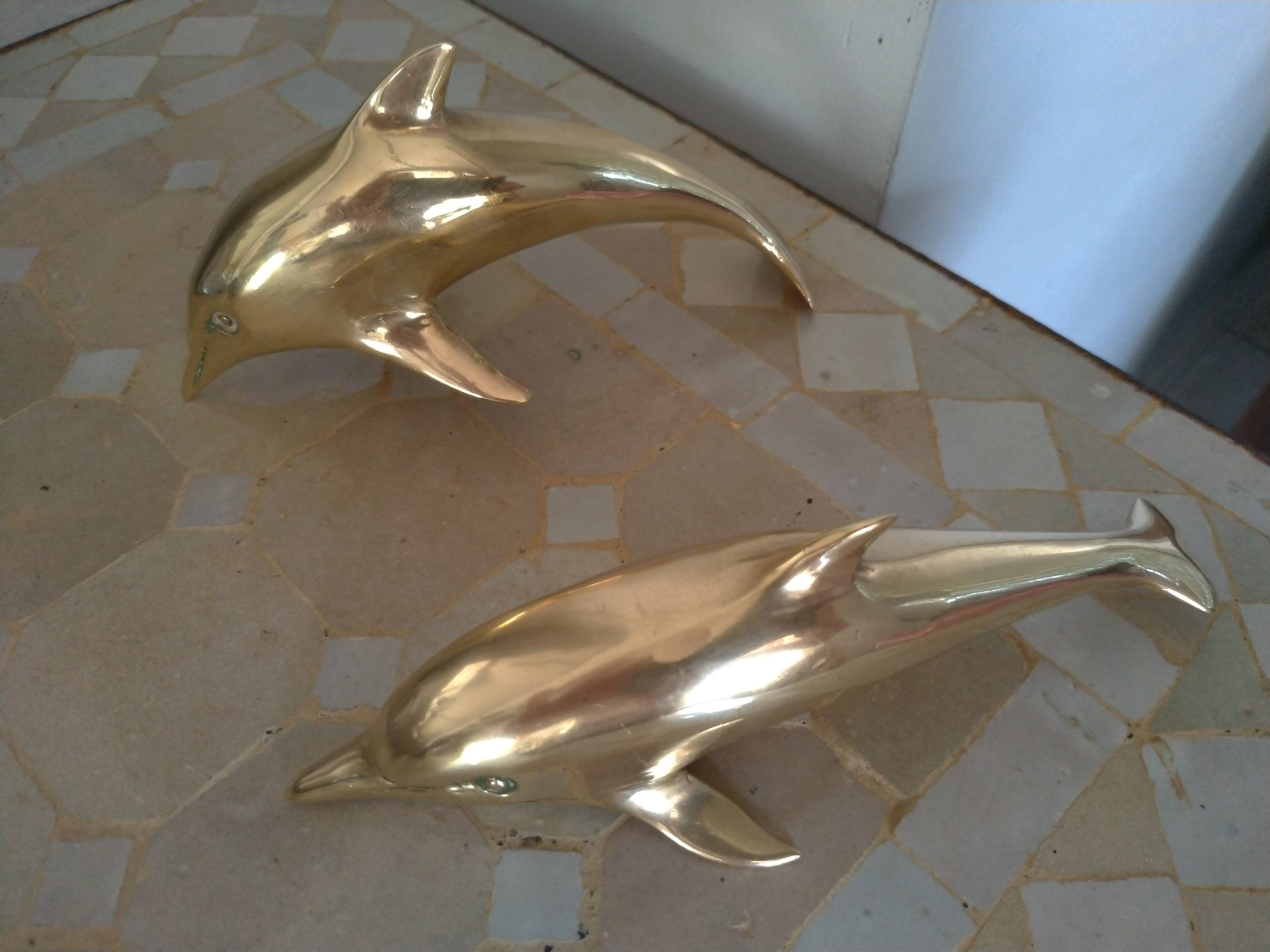 Brass dolphins