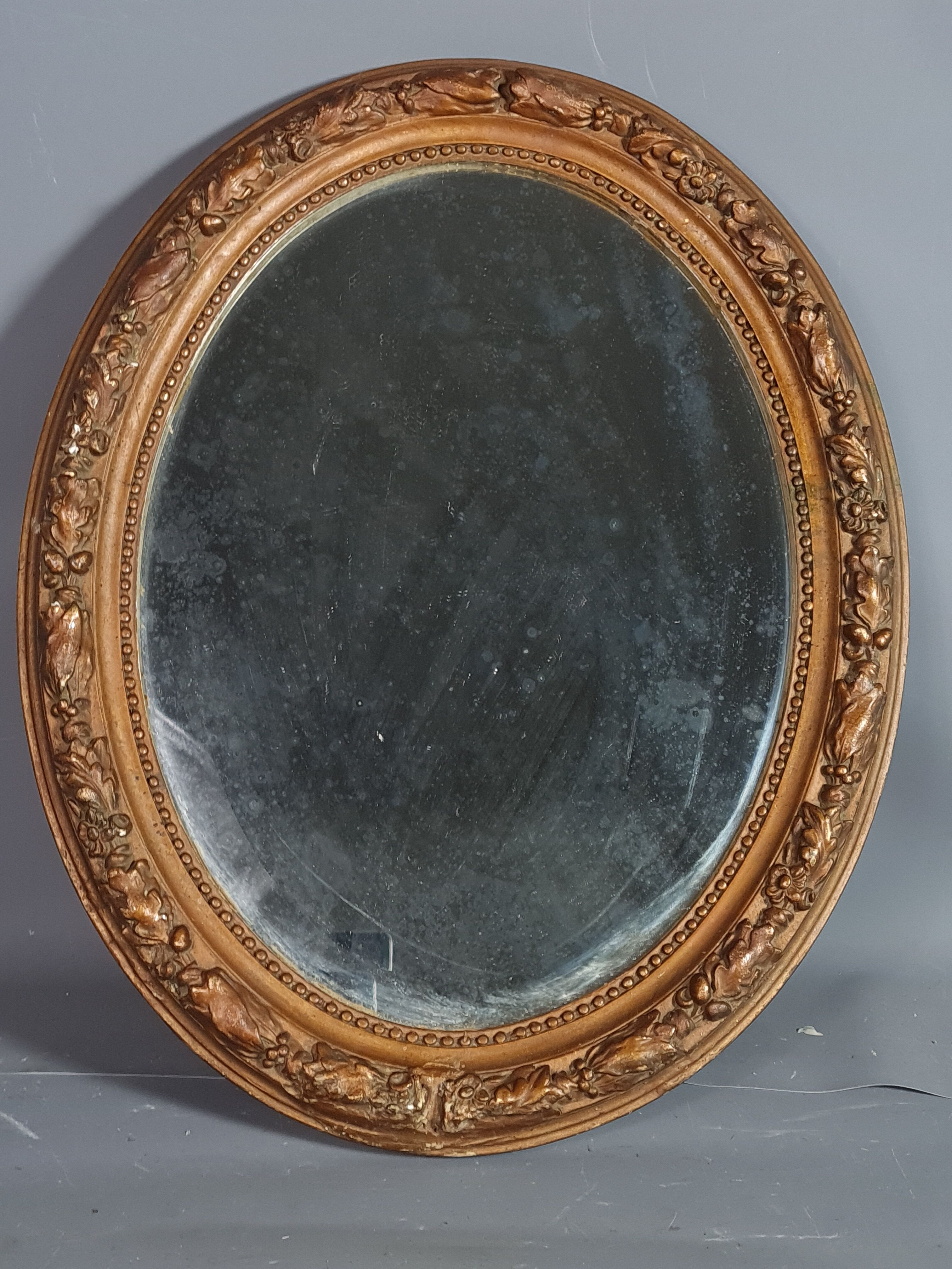Old oval mirror beveled wooden frame & gilded stucco 50x40 cm 1900