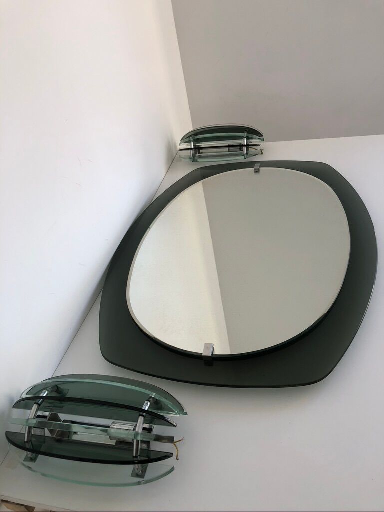 Veca mirror and 2 matching Veca wall lights made in Italy.