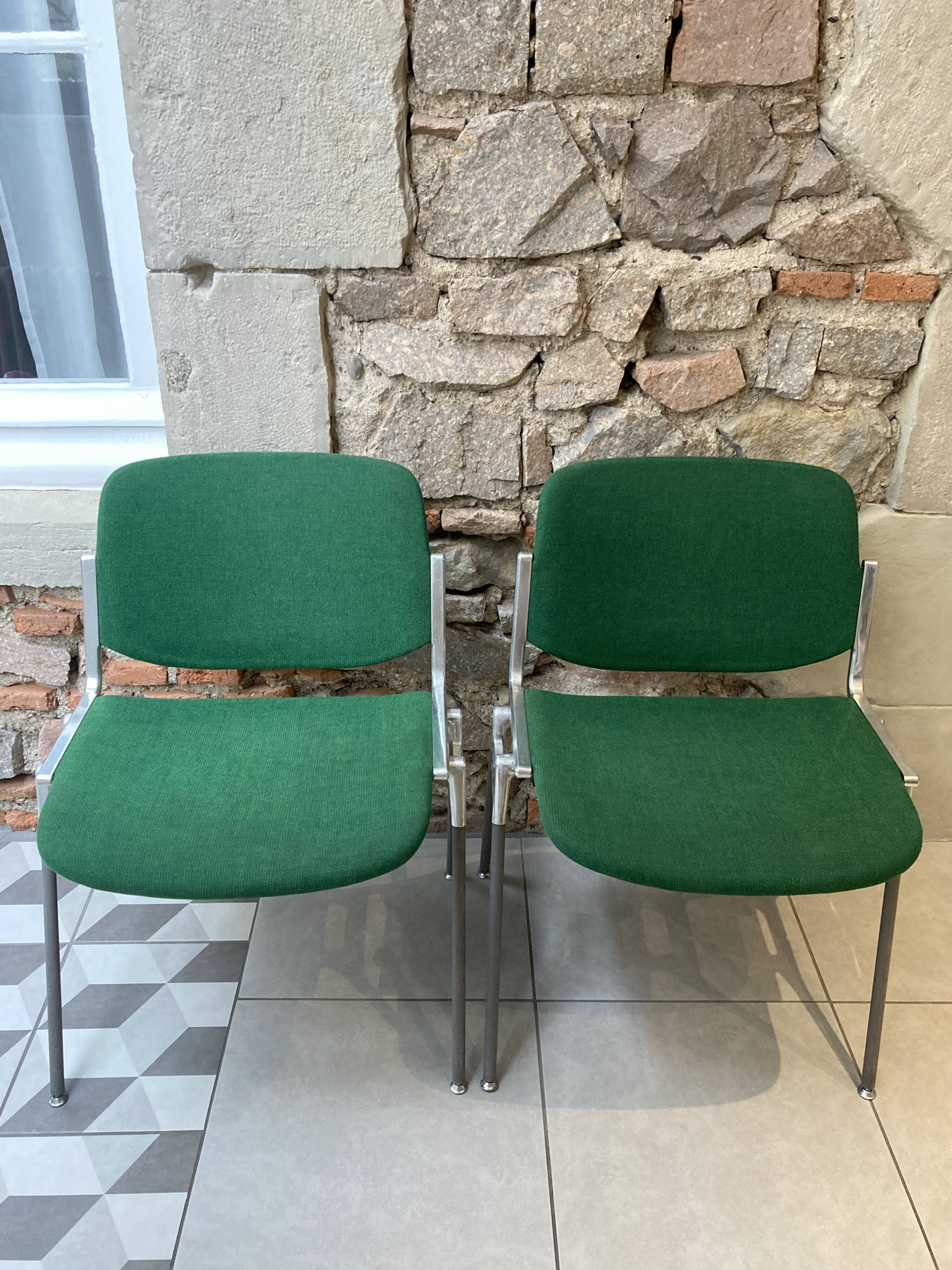 Pair of green DSC 106 chairs by Giancarlo Piretti