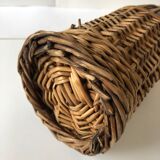 Amber and wicker glass bottle