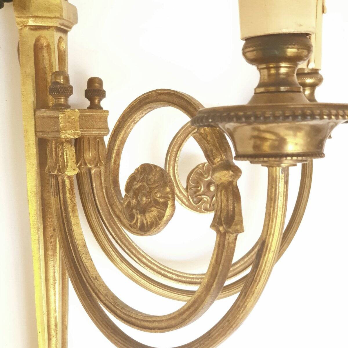 Pair of bronze wall sconces in Louis XVI style