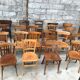 Set of 15 mismatched curved wood bistro chairs