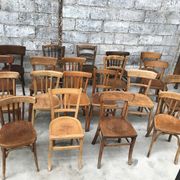 Set of 15 mismatched curved wood bistro chairs