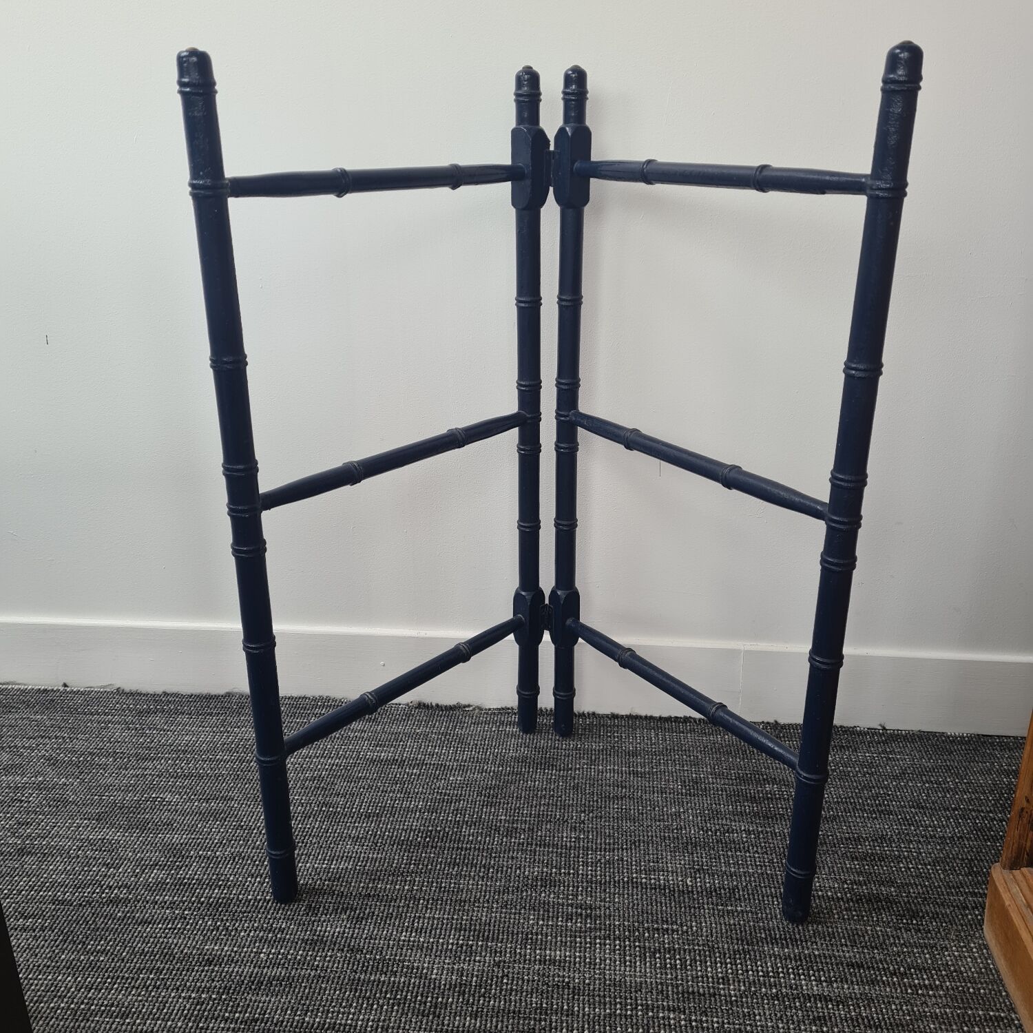 Wooden towel rail painted navy blue