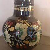Large glazed terracotta pitcher with floral decoration