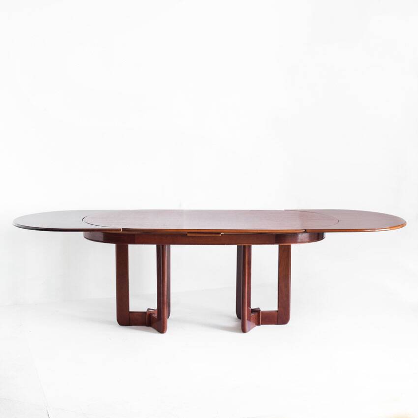 Vintage dining table with two extensions in varnished elm. Spain, 80s.