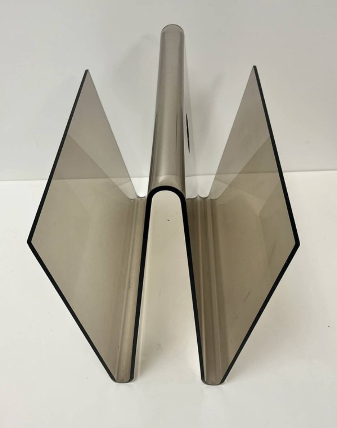 Smoked plexiglass magazine rack in the style of Michel Dumas, France, 1970s.