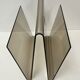 Smoked plexiglass magazine rack in the style of Michel Dumas, France, 1970s.