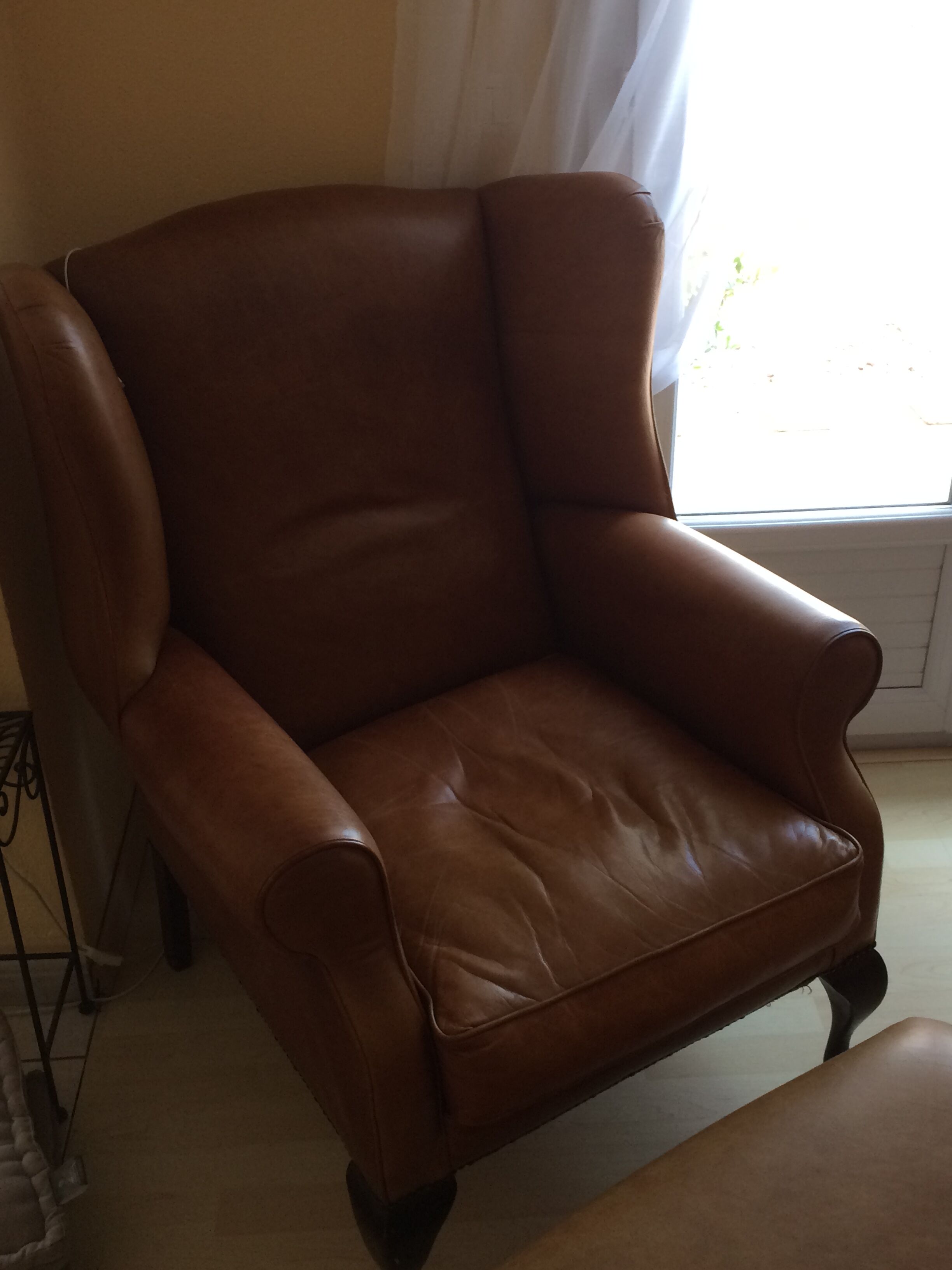 Laura Ashley brown leather armchair