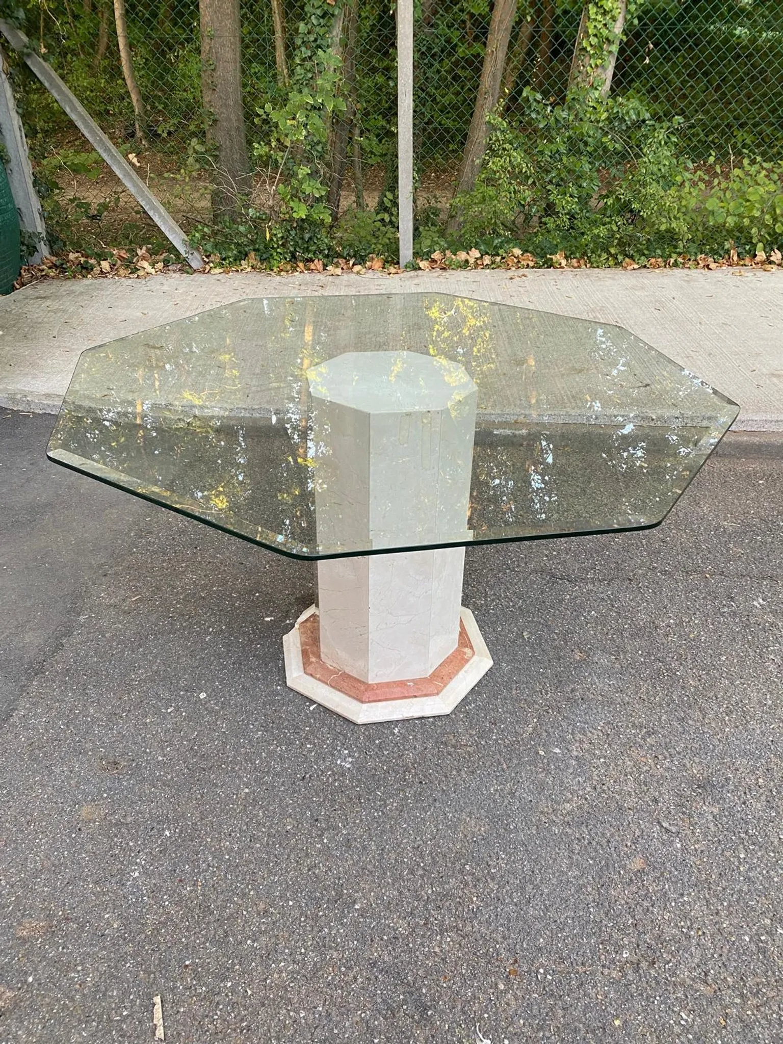 Octagonal dining table, vintage 1980s design in marble and glass.
