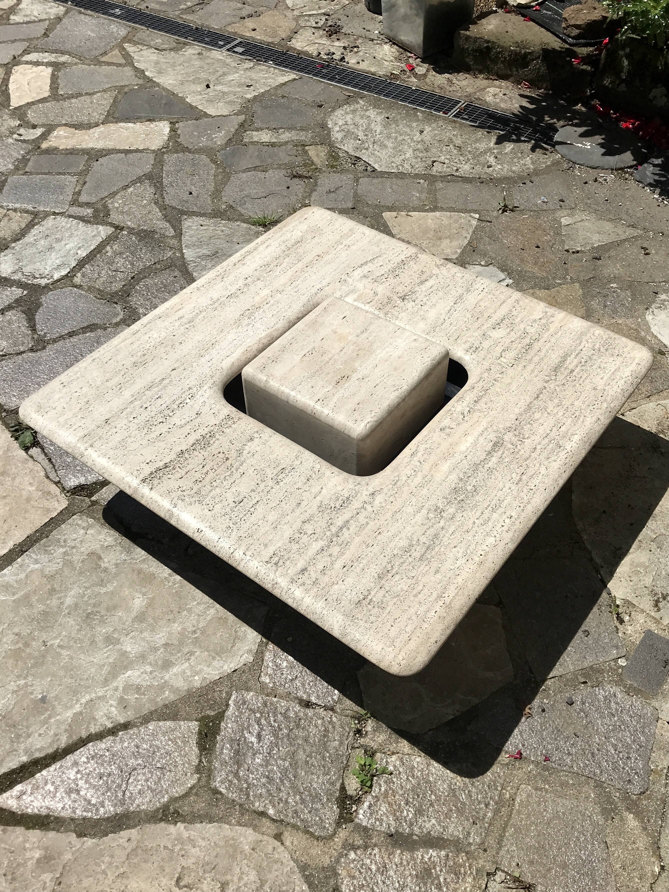 Sculptural travertine coffee table