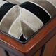 Luxury Art Deco 2.5-seater design sofa with beautiful woodwork and high-quality fabric upholstery