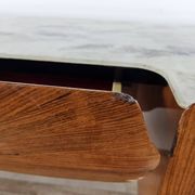 Mid-century drawer chest in mahogany, brass and glass.