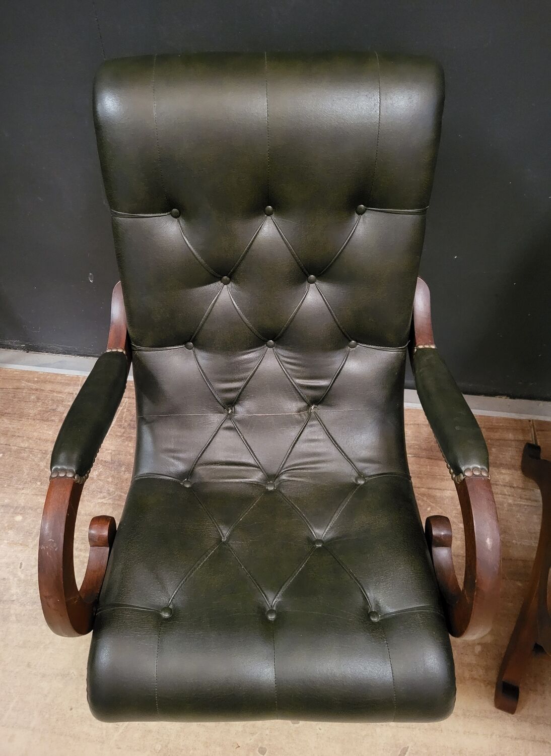 Pair of English Chesterfield armchairs in leather and solid wood