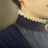 Oil on canvas portrait in an antique gilded wooden frame.