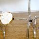 Dining table with smoked glass top and chrome base.