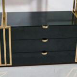 Brass laced library shelf by Kim Moltzer 1970