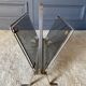 Foldable magazine holder in smoked glass and metal chrome dore 1970