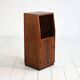 Cabinet with vinyl storage compartment