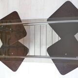 Chrome metal coffee table with smoked glass top.