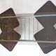 Chrome metal coffee table with smoked glass top.