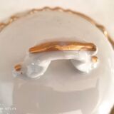 White porcelain sugar bowl decoration in relief and green and gold frieze