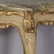 EARLY 20TH CENTURY BAROQUE-STYLE GOLDEN WOOD AND ONYX WALL CONSOLE TABLE