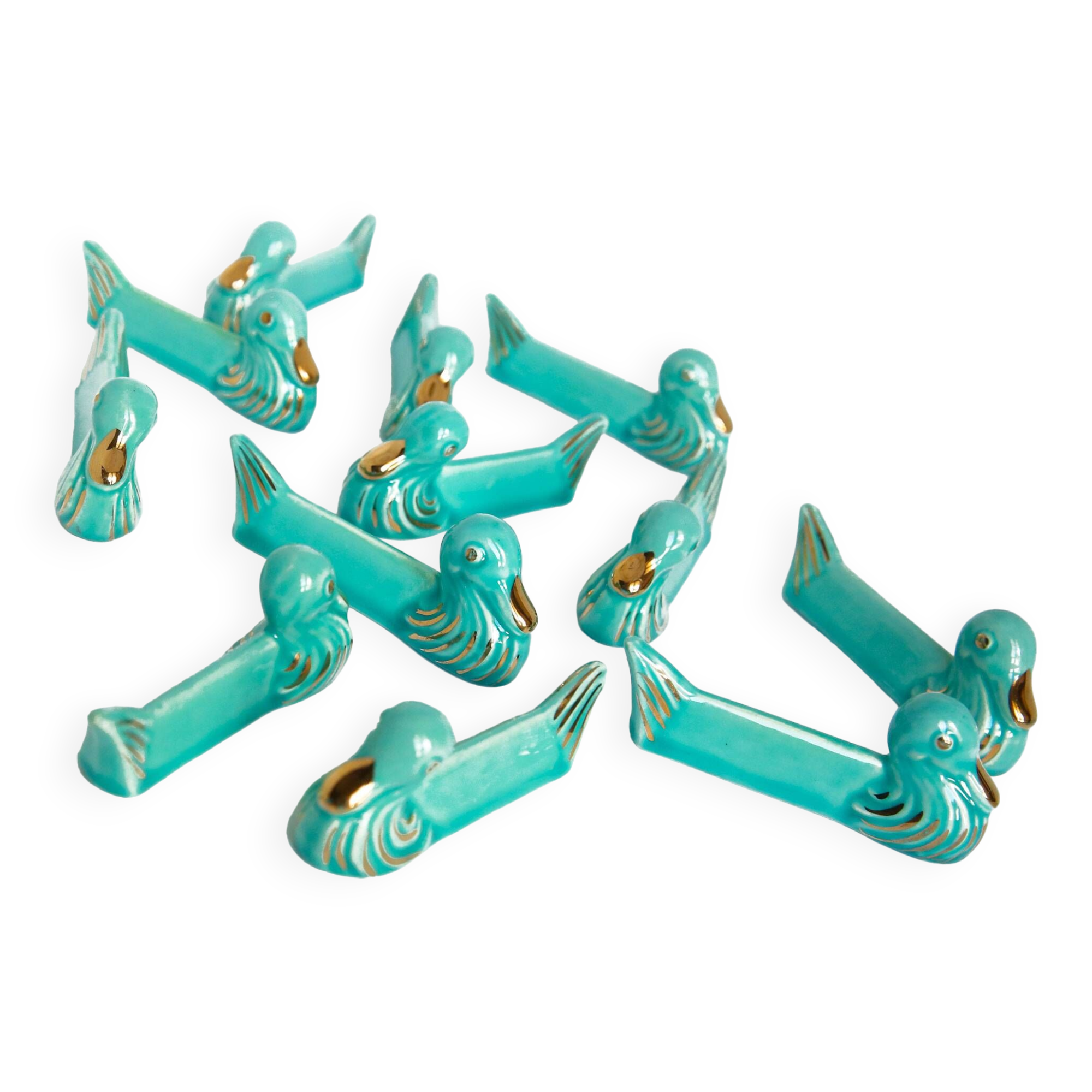 Set of 12 turquoise blue and gold duck knife holders mid-20th century