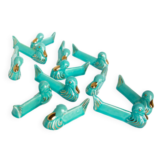 Set of 12 turquoise blue and gold duck knife holders mid-20th century