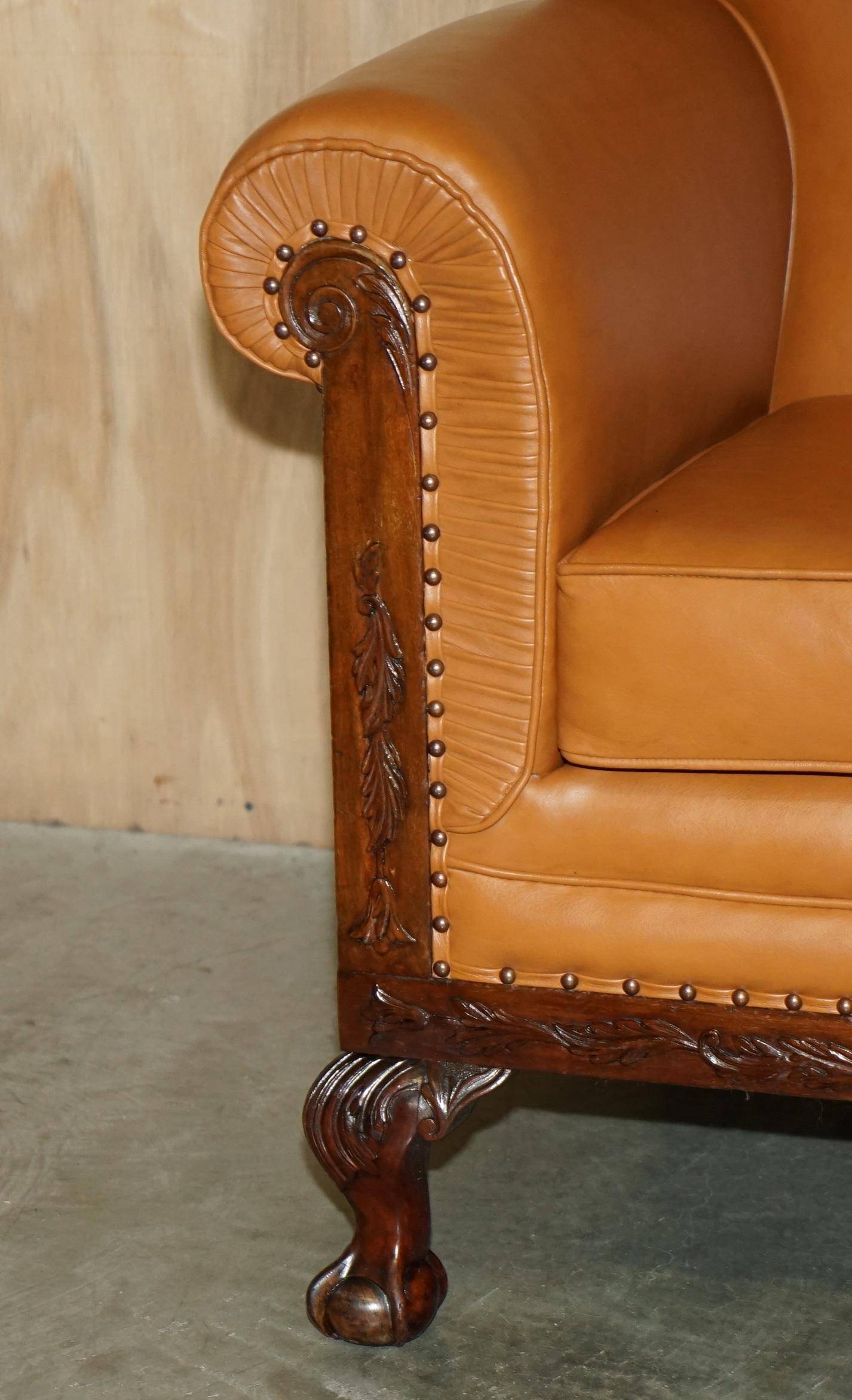 Restored three-seater leather canapé in late Victorian style.