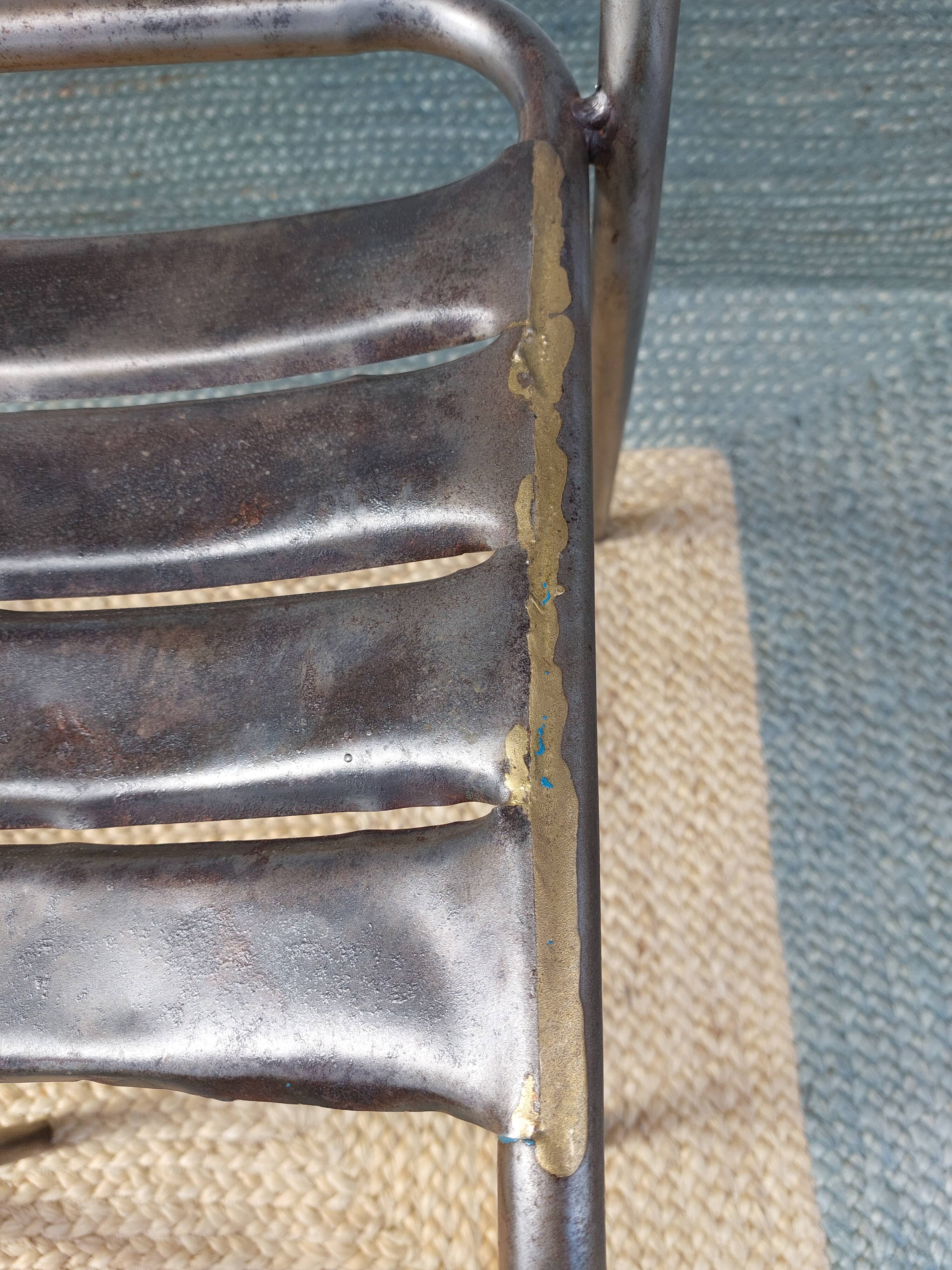 3 metal chairs, Tolix style