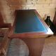 Wall-mounted writing table in cherry wood. retractable.