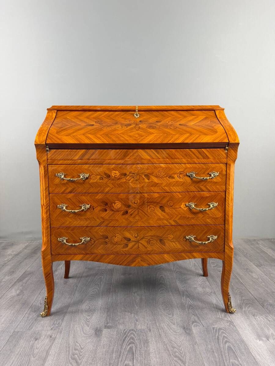 Louis XV style writing desk with a drop-leaf, made of veneer and marquetry, 19th century.
