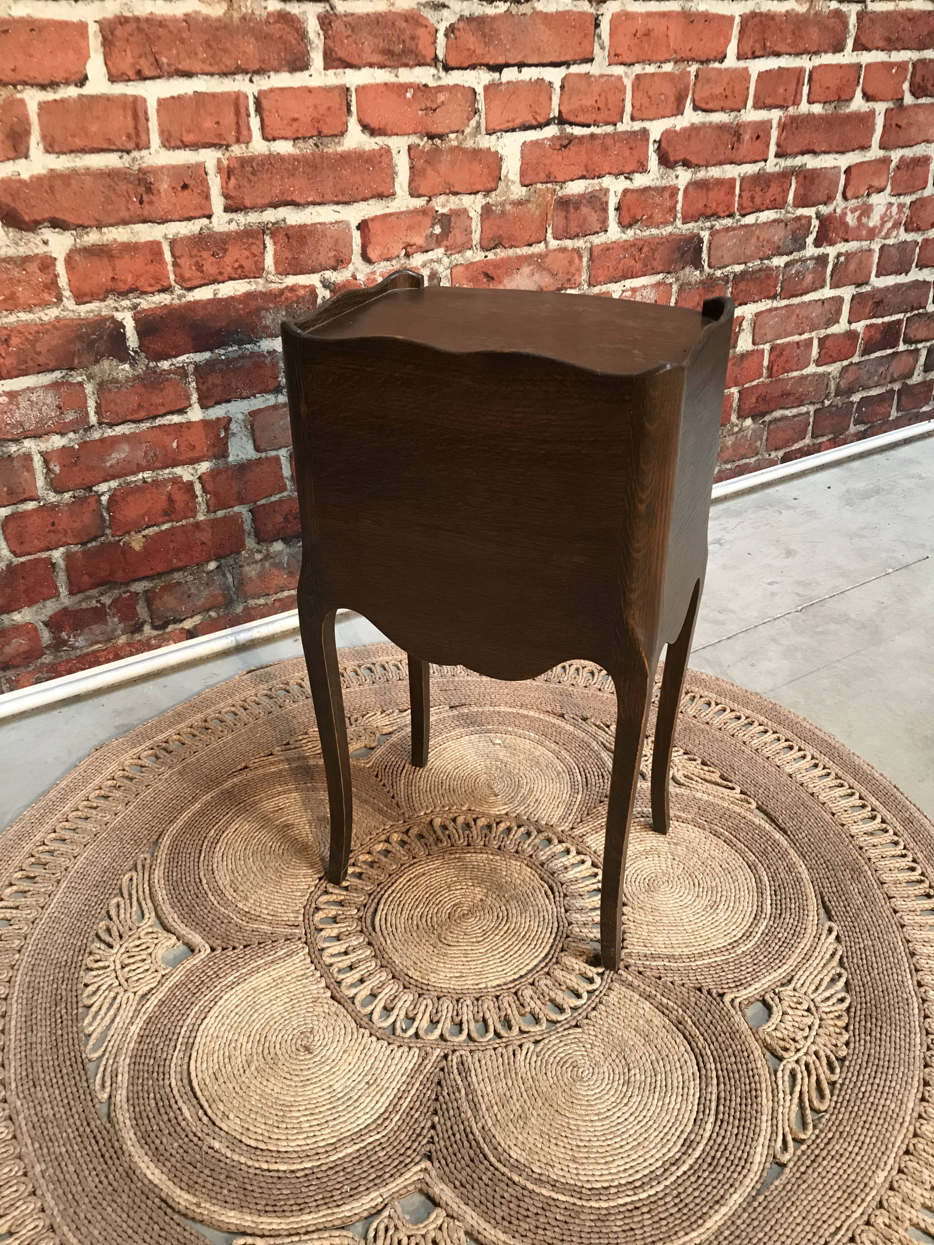 Classic dark wood bedside table