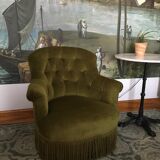 Old chair padded green velvet