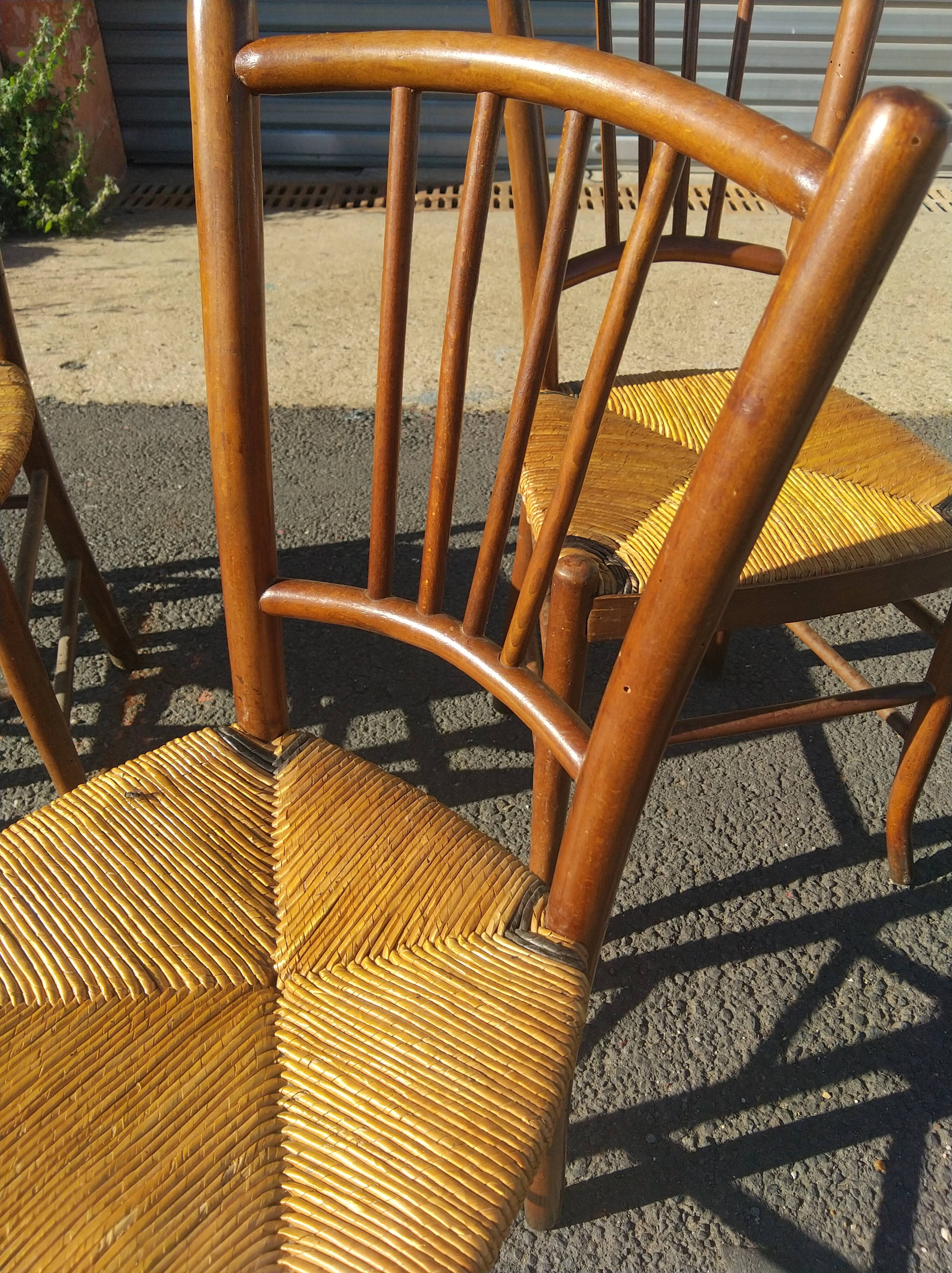 Set of 4 straw-seated bistro chairs