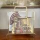 Designer brass magazine rack