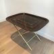 Beautiful table with a brass top and painted sheet metal