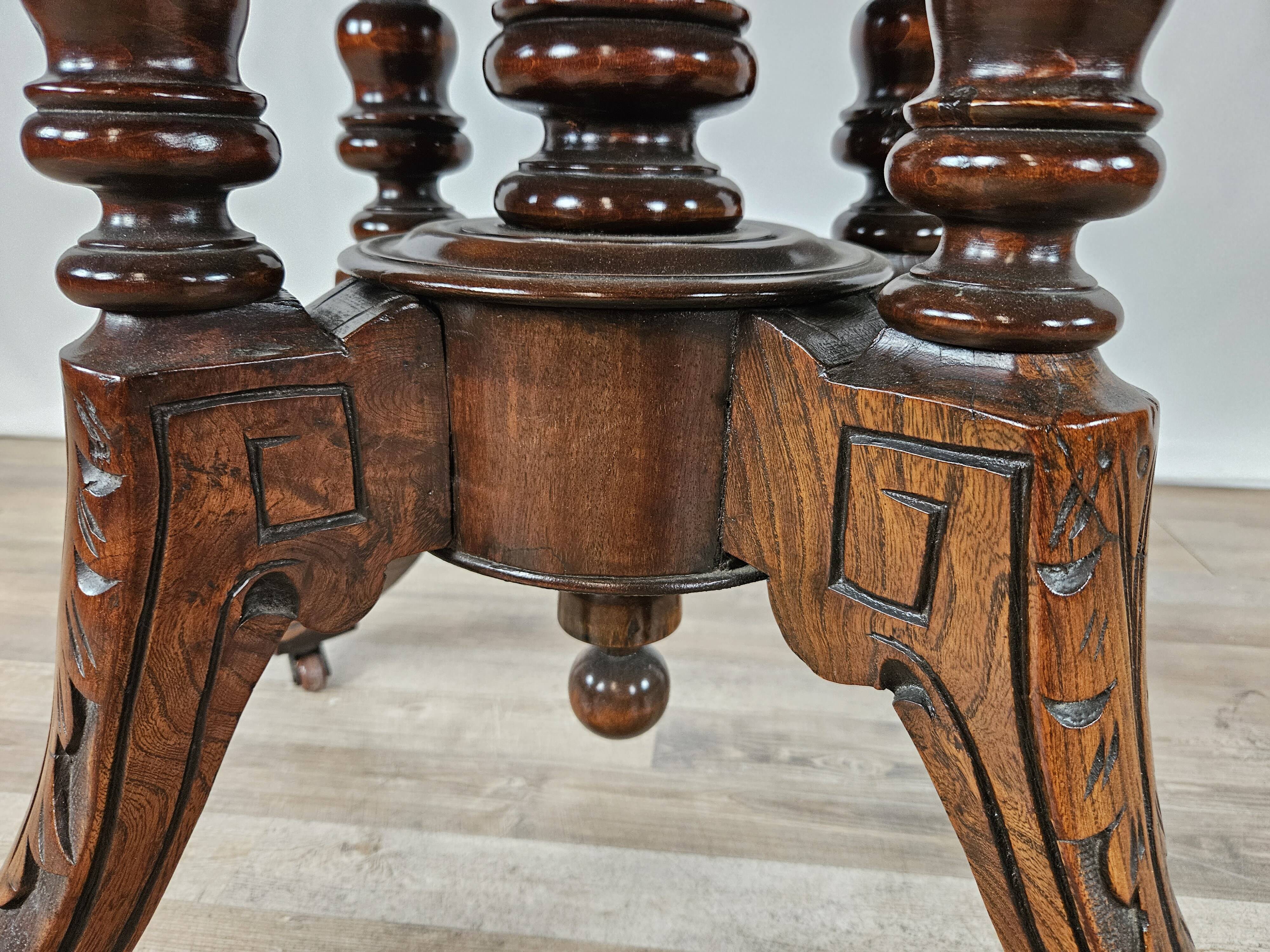 Coffee table in walnut with maple inlays and wheels