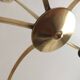 Lustre with 5 branches from the 1960s - 1970s in solid brass and black metal.