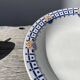 Round, shallow ceramic salad bowl from Saint Amand