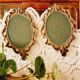2 frames in gilded metal and curved glass
