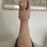 Terracotta sculpture of an entwined couple.