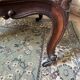 Napoleon III medallion armchair in carved wood and red velvet.